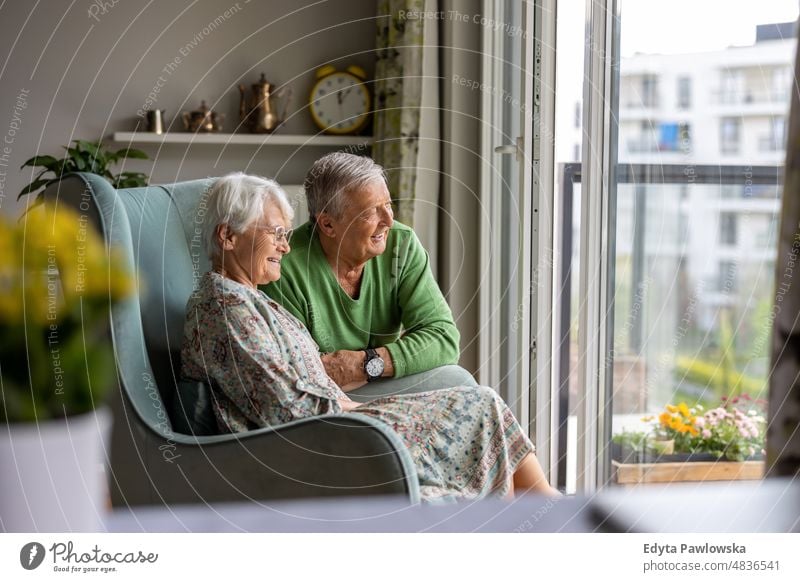 Happy senior couple at home senior adult older aged portrait person casual leisure lifestyle pensioner caucasian retired people mature retirement elderly