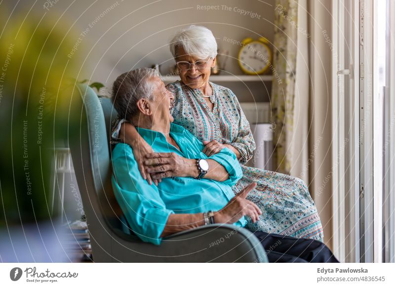 Happy senior couple at home senior adult older aged portrait person casual leisure lifestyle pensioner caucasian retired people mature retirement elderly