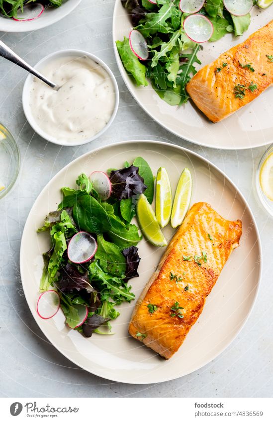 Grilled salmon fillet and fresh vegetable salad. Mediterranean diet. cooked dinner dish eating filet fish food fried green grill grilled healthy leaf lemon