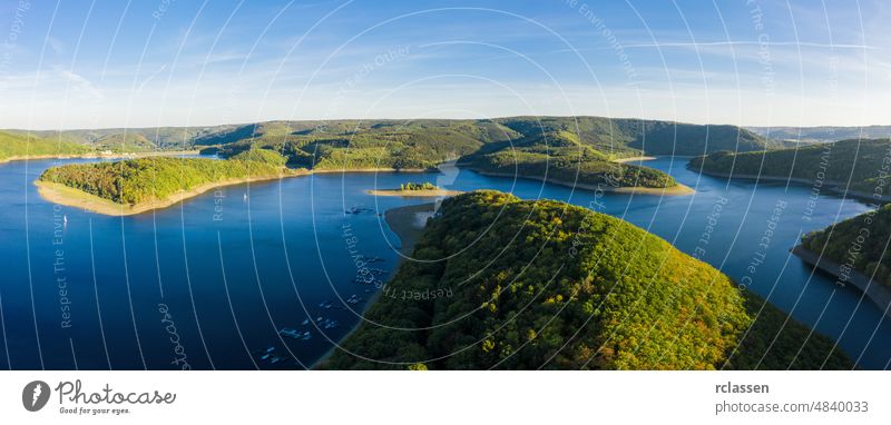 Lake Rursee, Eifel Germany eifel rursee aerial blue drone green sunrise sunset national park nature outside panorama sun flare sunlight reservoir clouds sky