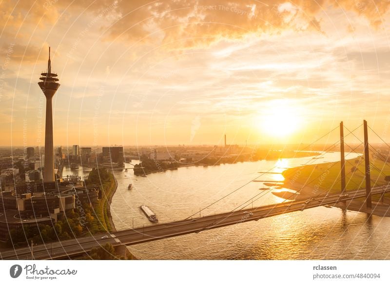 aerial view of dusseldorf at sunset with the Rheinknie Bridge germany tower river europe city blue rhine summer panorama architecture medienhafen harbor