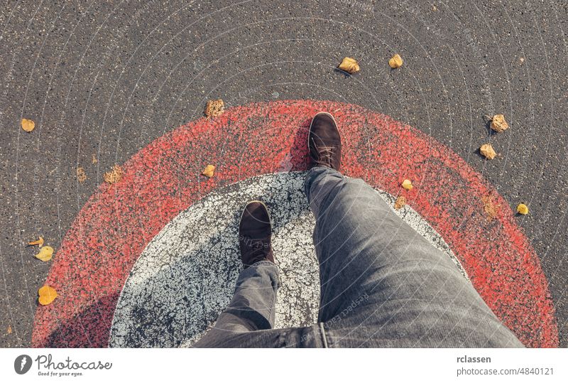 Young man in sneakers steps outside a circle at the streets, personal pespective pov people lifestyle point view way caucasian young first person view