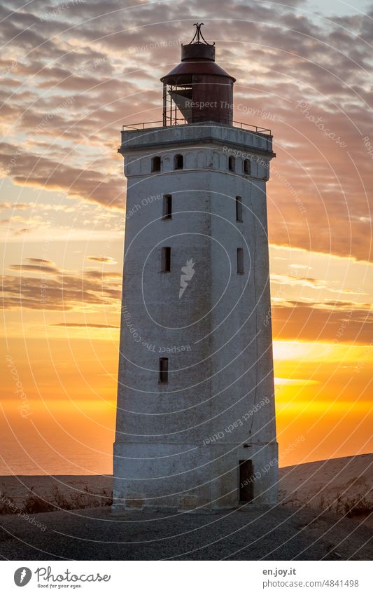 Rubjerg Knude leeward tower in the backlight of the sunset Lighthouse Wanderdüne Rubjerg Knude Denmark duene Sunset evening sky Vacation & Travel Sand