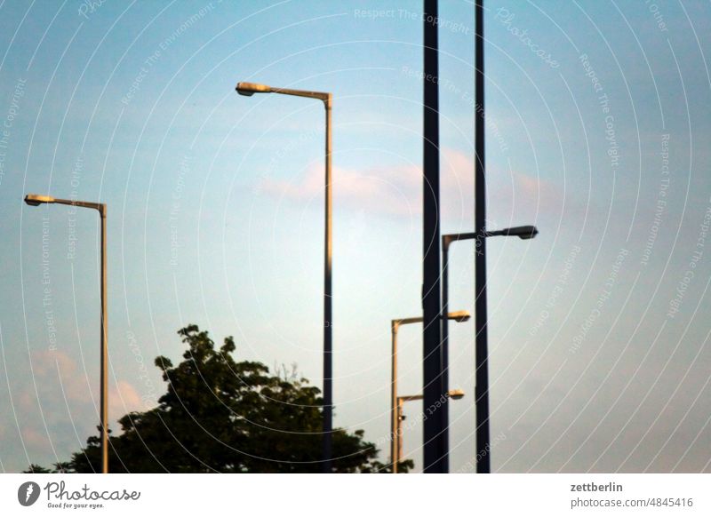 Lanterns at de A 100 Evening Twilight colour spectrum Closing time Worm's-eye view Sky background Climate Climate change Light Deserted Meteorology Romance