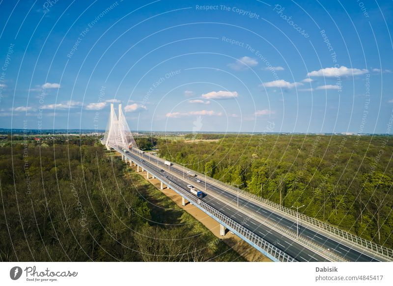 Large bridge over river with cars traffic aerial transport road highway landscape wroclaw redzinski nature bird eye view sky moving driving top city overhead