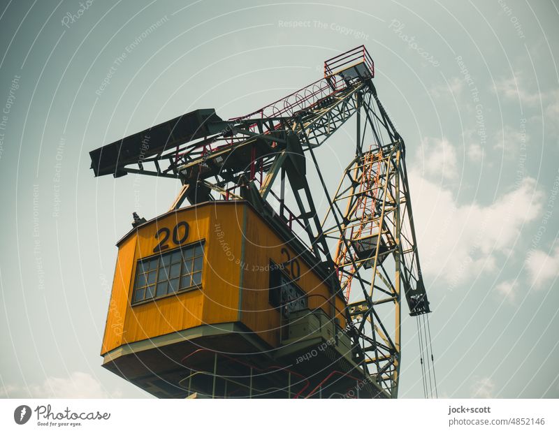 Port crane number 20 Crane Technical monument Industry Magdeburg Harbour Dockside crane Logistics slewing crane Technology Shadow Sky Clouds Historic GDR Tall