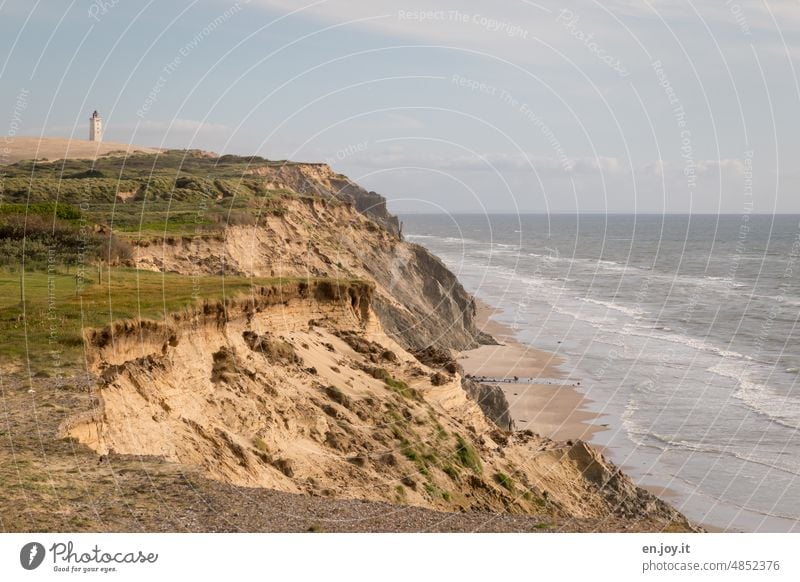 Steep coast with leeward tower Rubjerg Knude Fyr Lighthouse Wanderdüne Rubjerg Knude Denmark Beach dune North Sea Tourist Attraction Vacation & Travel Jutland