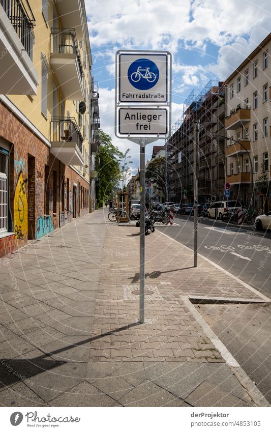 Traffic in Berlin: bicycle street Exterior shot Gloomy real estate Multicoloured Copy Space left Copy Space bottom Real estate market house purchase Tourism