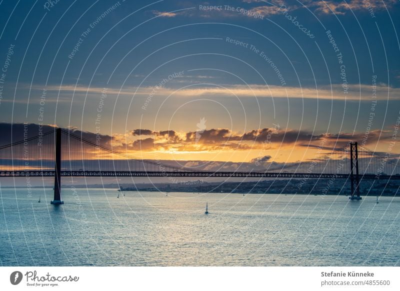 Atmospheric sunset in Lisbon Sunset Bridge Ocean colourful Tejo Tejo Bridge Tourism Vacation & Travel Portugal travel Colour photo Architecture Capital city