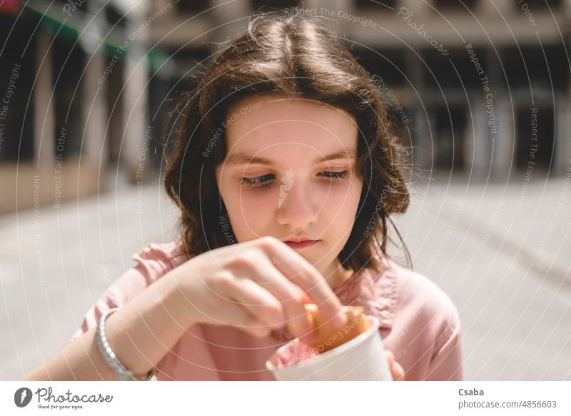 Portrait of teenage girl eating ice cream portrait preteen summer summertime holiday sweet food lifestyle 12-13 year old female one young dessert face cute