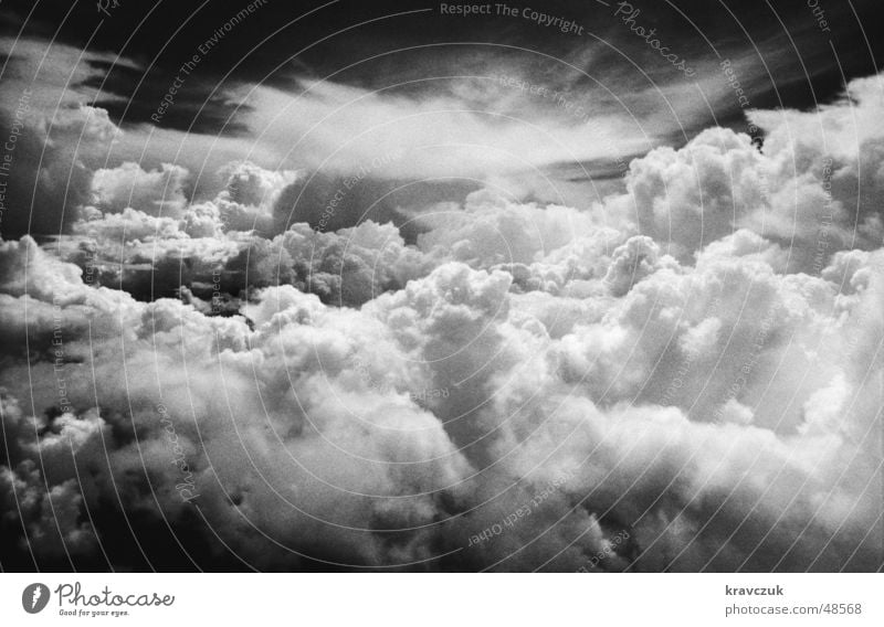 In another world Clouds Cumulus Far-off places Vantage point Sky Level Dramatic Black & white photo Contrast Aviation dohend Review