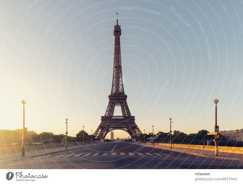 Sunrise at the Eiffel tower, Paris. France eiffel landmark france road skyline europe sun flare summer seine view travel romantic traffic sunrise city river