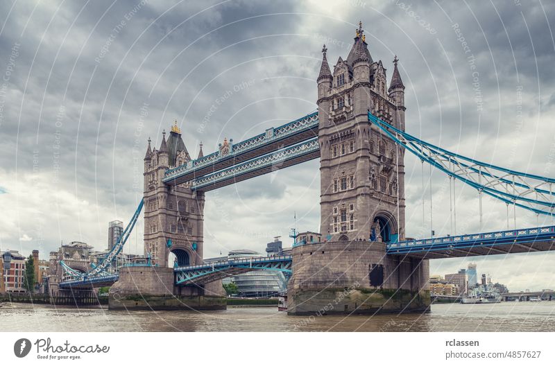 Famous Tower Bridge with dramatic cloudy sky in London, England tower bridge great Britain thames building city drawbridge capital uk United Kingdom sightseeing