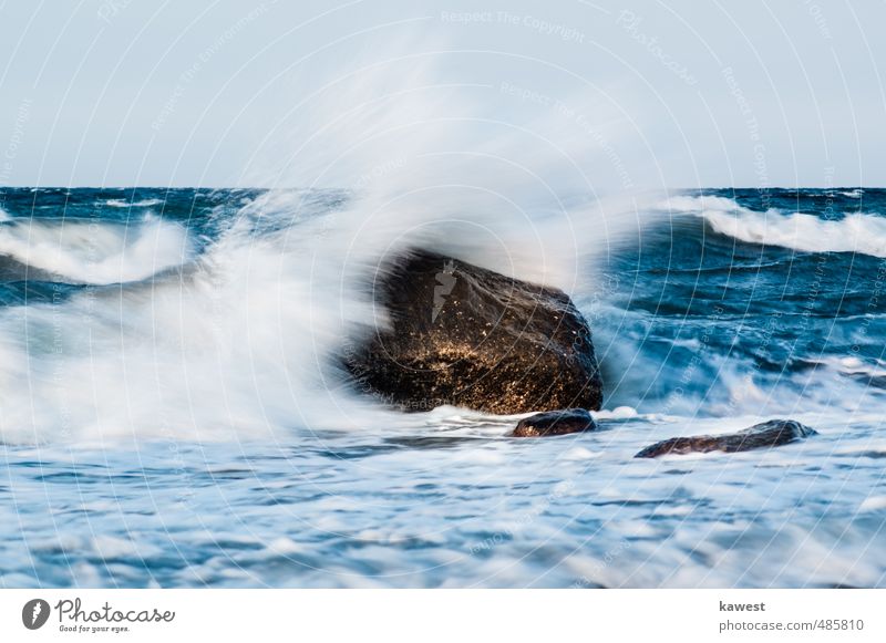 Stone in the surf Vacation & Travel Tourism Freedom Ocean Waves Environment Nature Water Drops of water Cloudless sky Horizon Summer Weather Bad weather Storm