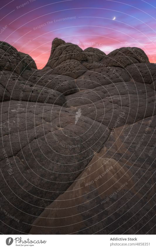 Scenic view of canyon under sunset sky vermillion cliffs landscape travel arizona thunder moon desert twilight usa outdoors nature monument arid colorful