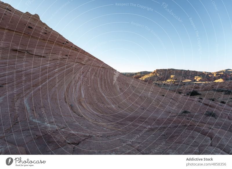 Scenic from below view of mountain vermillion canyon cliffs landscape travel arizona desert usa outdoors nature monument arid colorful wilderness stone brown