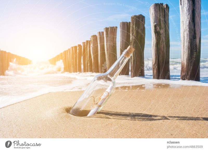 Message with letter inside the bottle on a beach domburg netherlands zeeland holland dutch europe sylt sea holidays water coastal travel vacation tourism summer