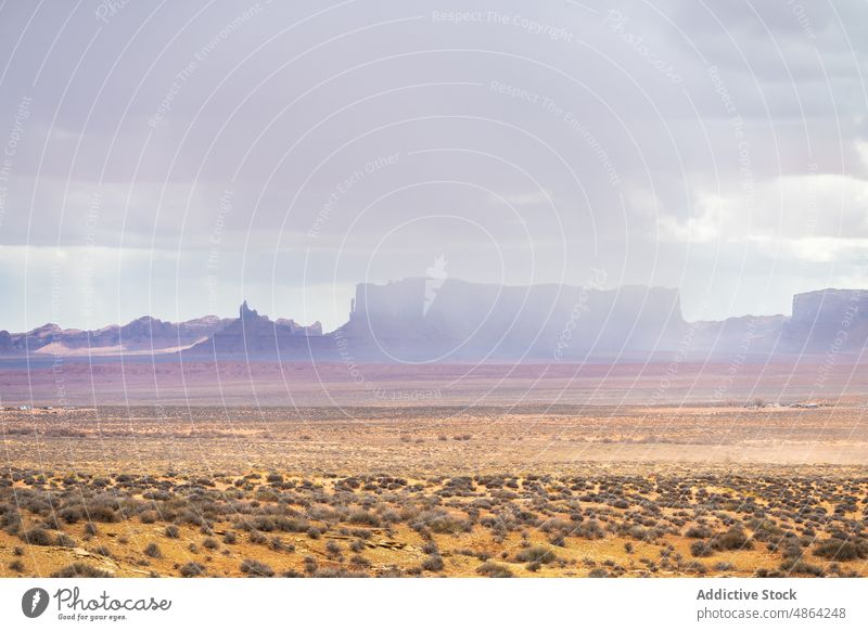 Scenic from above view of mountain cliffs utah Arizona national park landscape Monument Valley cloudy travel butte rocky outcrop Navajo Tribal Park desert usa