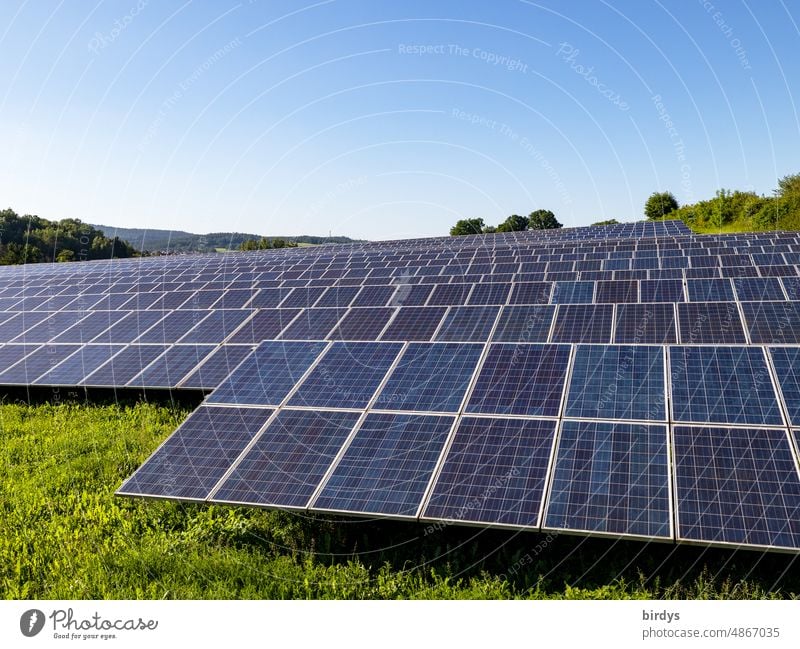 PV open space plant , photovoltaic open space plant in front of cloudless sky, PV modules photovoltaics PV system PV ground-mounted system green electricity