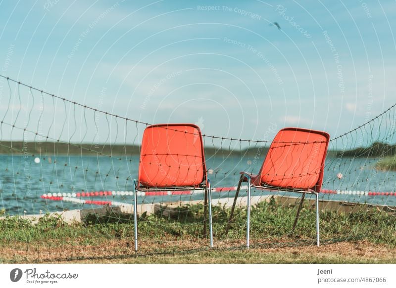 Honorary office no longer occupied Lake Water vacation Lifeguard Observe Blue Orange 2 chairs Empty Seating stacking chair buoys water rescue outlook