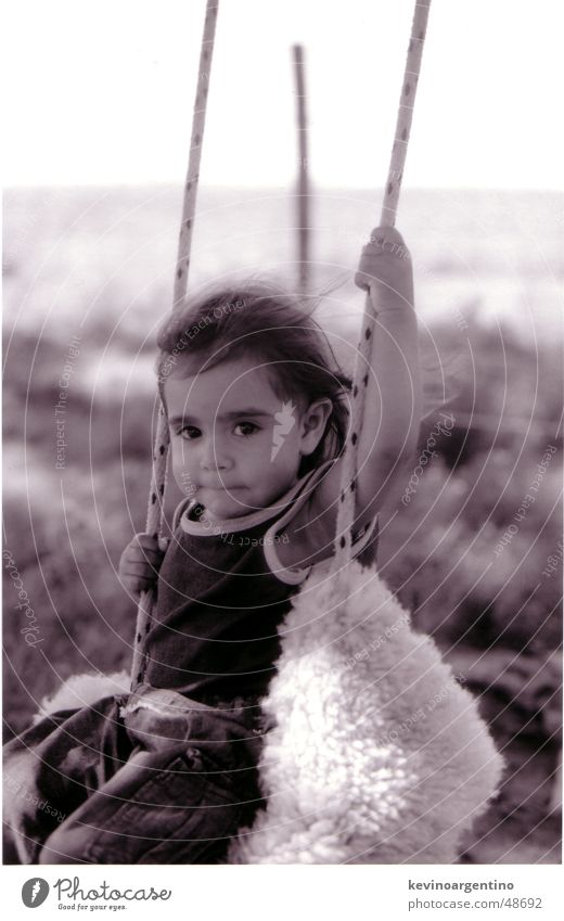 The daughter of Don Aguero Argentina Child Girl Swing Black & white photo