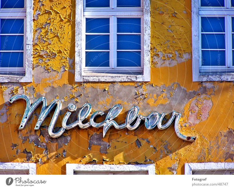 The old milk bar Window House (Residential Structure) Yellow Milk Milk bar Gastronomy Wood Brick Dry Blue Roadhouse Stralsund Baltic Sea Frame Construction site