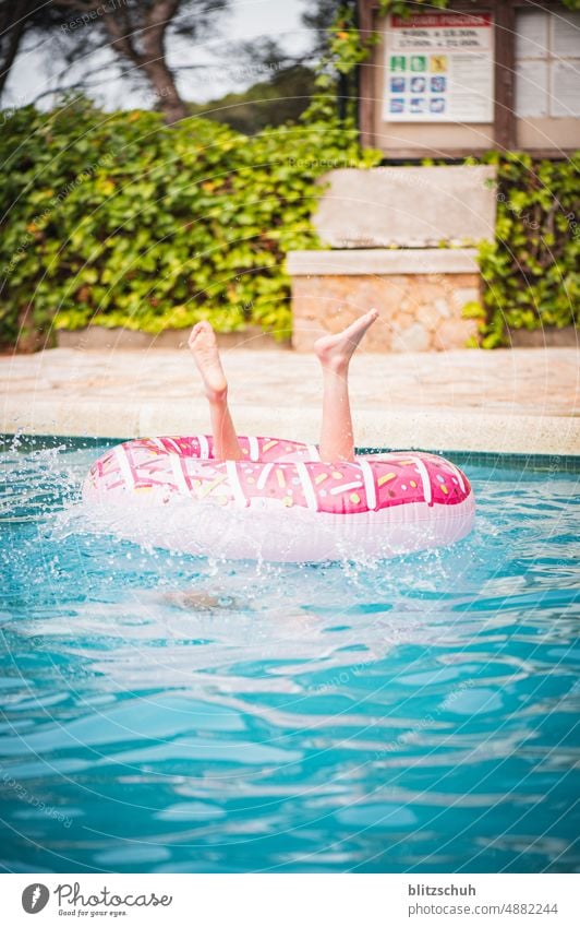 Through the ring into the pool for a cool down summertime Summertime swimming pool Day Dive Lifestyle Water Jump snorkel Child Bathroom Relaxation Wet fun Joy