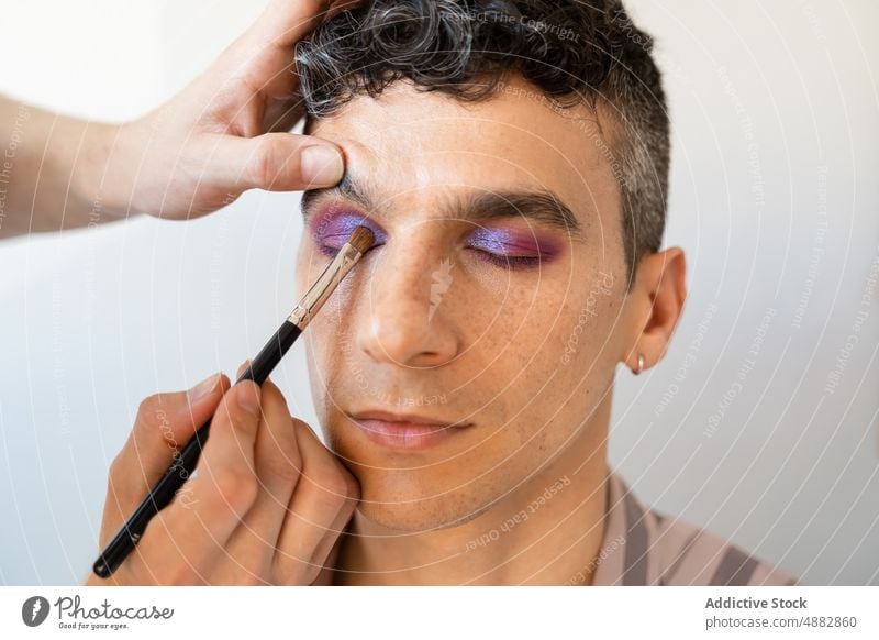 Transgender Man Getting Makeup Done By Boyfriend Couple Applying Eye Shadow Artist Cosmetic Gay Vanity Brush Together Palette Beautician Looking Away Beauty