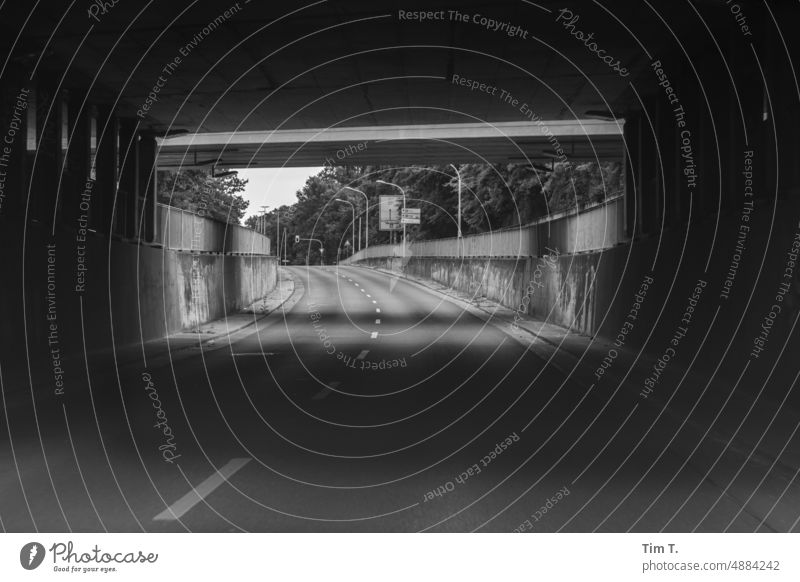 a road passes under a bridge Bridge b/w Street Black & white photo B/W Exterior shot Day Deserted Town Architecture Calm Loneliness Cottbus Underpass