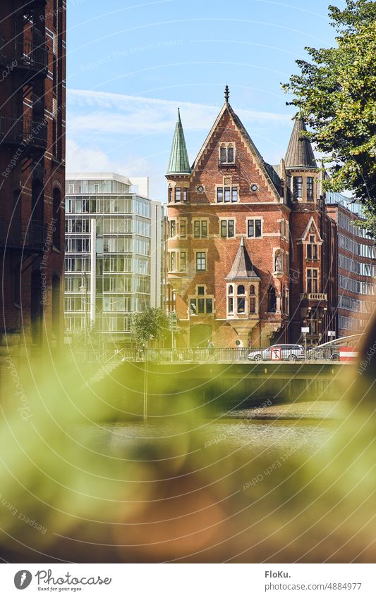 Historic building in Hamburg Speicherstadt storehouse city Fleet Old warehouse district Water Brick Bridge World heritage Architecture Channel Germany Facade