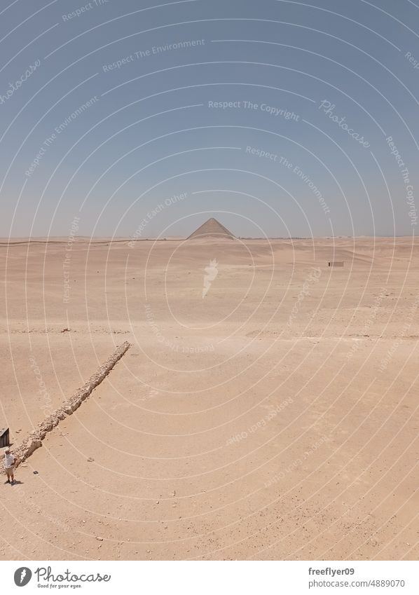 Lone pyramid in the middle of a huge desert in Egypt lone egypt pyramids chéops landmark ancient giza old ruin cairo famous historic egyptian together vibrant