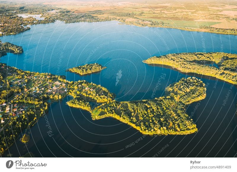 Lyepyel, Lepel Lake, Beloozerny District, Vitebsk Region. Aerial View Of Lyepyel Cityscape Skyline In Autumn Morning. Morning Fog Above Lepel Lake. Top View Of European Nature From High Attitude In Autumn. Bird's Eye View