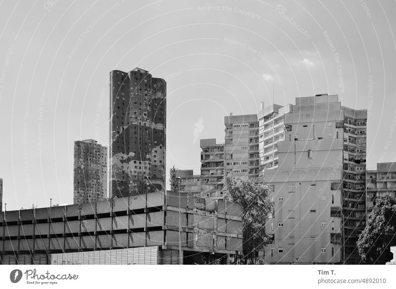 View of a prefabricated building in Paris bnw b/w Prefab construction Summer Black & white photo Day Exterior shot Deserted France Downtown Capital city Town