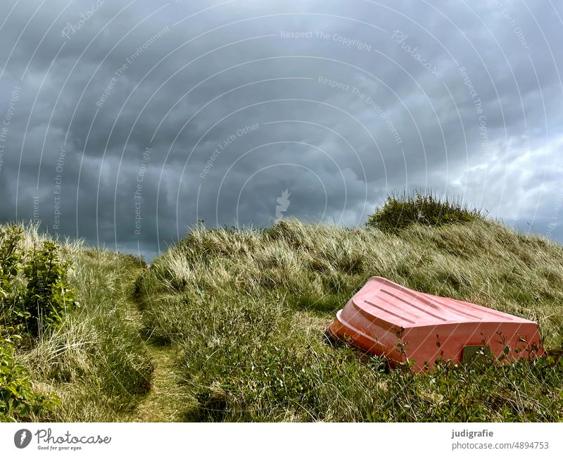 Boat by the fjord boat Fjord Denmark Jutland Sky Clouds Clouds in the sky Grass Hill path Trail Weather Dramatic dramatic sky Red tranquillity Nature Landscape