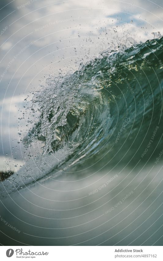 Stormy blue sea with waves ocean power water nature landscape seascape coast surf tropical crest summer splash foam seashore surface storm wet adventure marine