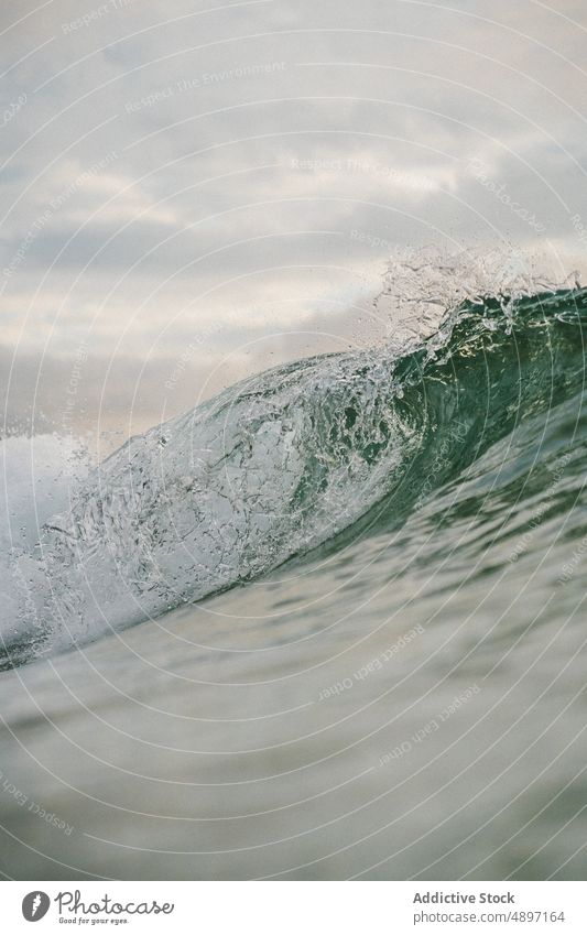 Stormy blue sea with waves ocean power water nature landscape seascape coast surf tropical crest summer splash foam seashore surface storm wet adventure marine