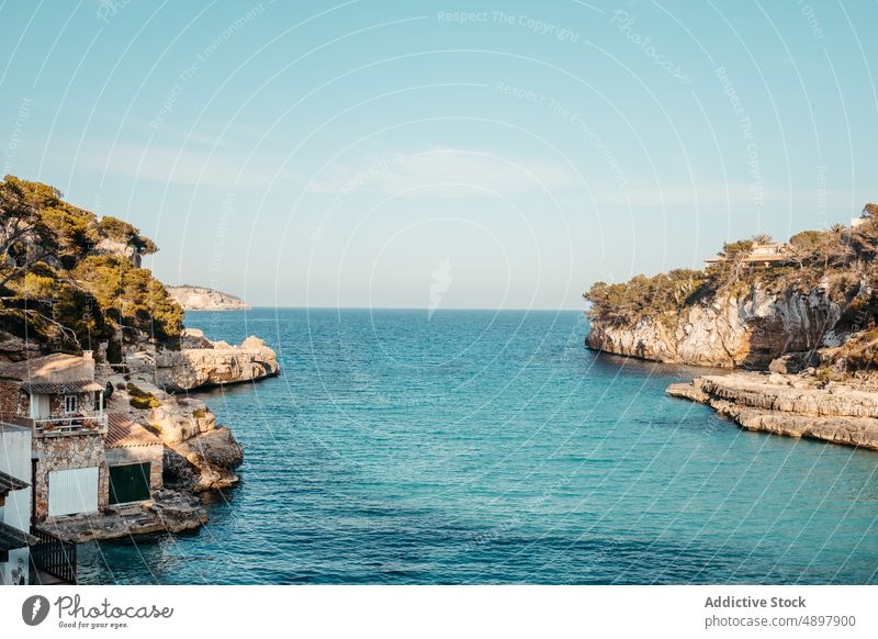 Picturesque seascape with massive rocky cliff in Mallorca landscape scenery nature formation seashore spectacular breathtaking ocean scenic mountain dwell