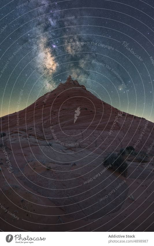 Stone on mountain with milky way on sky vermillion canyon cliffs landscape travel night arizona desert usa outdoors nature star monument Edmaiers Secret arid