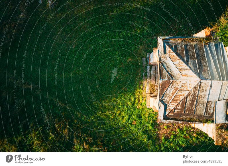 Martinovo, Beshenkovichsky District, Vitebsk Region, Belarus. Bird's-eye View Of Church Of The Intercession Of The Most Holy Theotokos. Aerial View Of Historic Landmark In Autumn Sunny Evening. Flat View