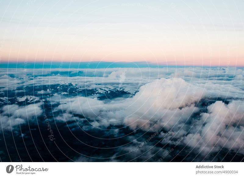 Cloudy sky over rocky mountains cloud snow nature altitude winter hoar cumulus frost scene cloudless scenic environment scenery spectacular majestic light wild