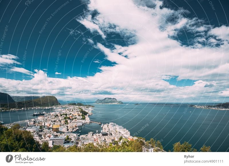 Alesund, Norway. Amazing Natural Bright Sunset Dramatic Sky In Warm Colours Above Alesund Islands. Famous Norwegian Landmark And Popular Destination. Top View