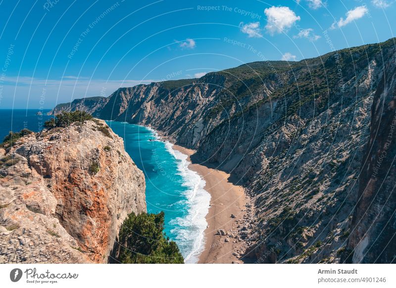 Ammos beach on Kefalonia Greece island mediterranean summer aerial view lonely ocean sea blue turquoise rocks sand stone mountain nature journey trip travel