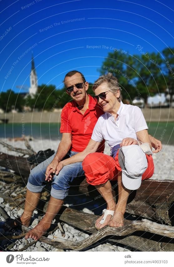 Summer trip | happy senior couple | taking a break at the beautiful Isar river near Bad Tölz. people senior citizens Couple Lifestyle older Woman Man Mature