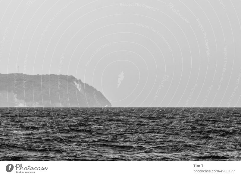 the Baltic Sea and in the background the island of Rügen bnw b/w Day Black & white photo Exterior shot Deserted