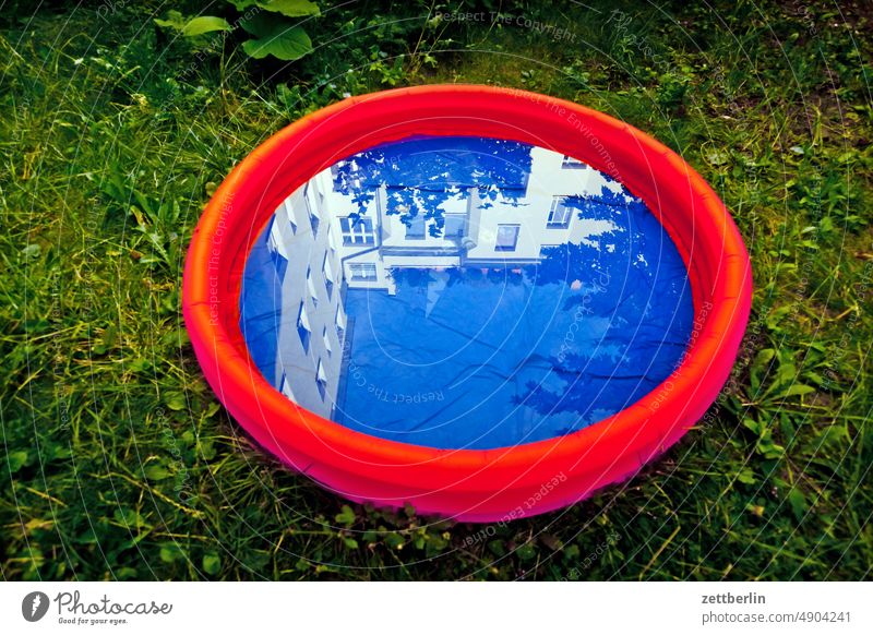 Paddling pool in the backyard Old building on the outside Refreshment Facade holidays House (Residential Structure) rear building Backyard Courtyard