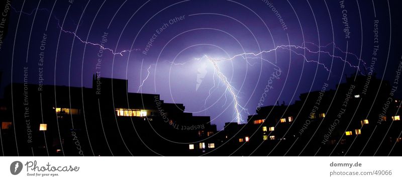 the impact Thunder Weather House (Residential Structure) Night Tower block Block Violet High-rise Window Long exposure Disastrous Impact Thunder and lightning