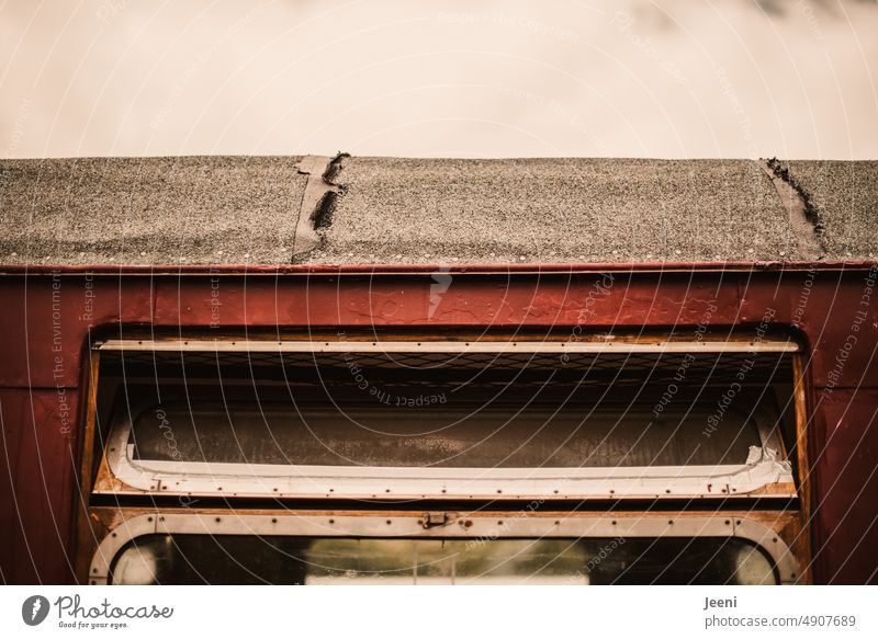 Window of an old train car Train hinged window Track railcar Brown russet Vehicle Old Derelict Ravages of time Past travel Broken forsake sb./sth. Transience