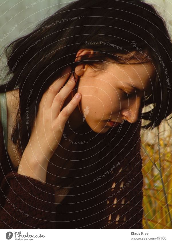 kiako Feminine Beautiful Woman Wall (building) Grass Hand Humble Grief Dreamily Absentminded Calm Exterior shot Portrait photograph Dusk saskia Face Sadness