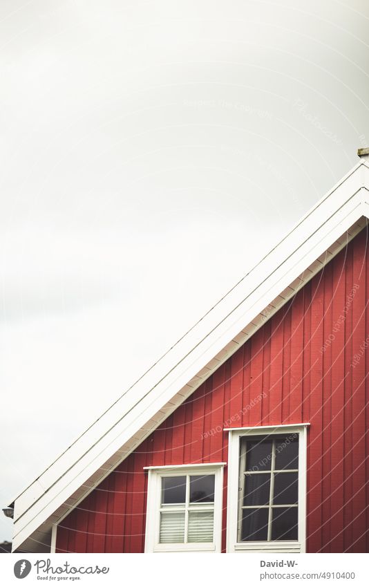 Red swedish house as triangle Swedish house Scandinavia Wooden house Christmas Swede House (Residential Structure) Window Roof Sky Vacation home Hut