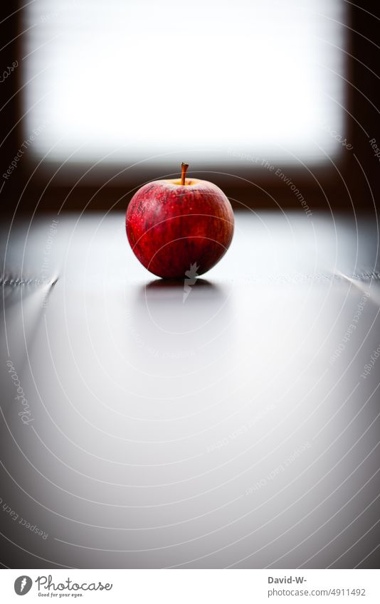 an apple on a table Apple Red salubriously vitamins Contrast variegated Art fruit Healthy Eating Food Fruit Nutrition Table Center point